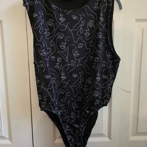 Black Bodysuit with Abstract Face Design